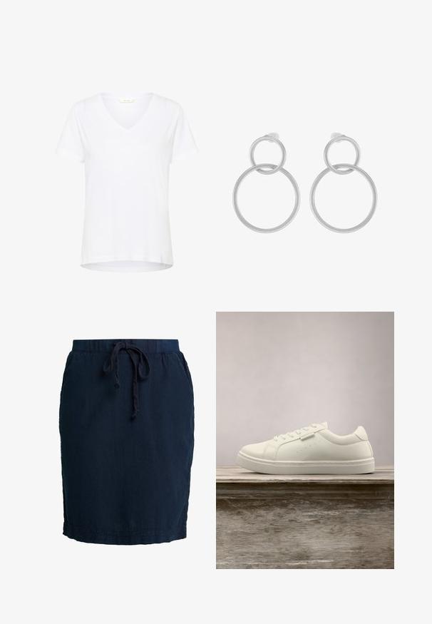 Witte T-shirt met korte mouwen en V-hals, gemaakt van zachte stof, met een relaxte pasvorm en rechte zoom met minimale stikdetails.; Navy blauwe rok met elastische tailleband en verstelbaar trekkoord. Gemaakt van lichtgewicht stof, met een middelmatige lengte en zijnaad.; Witte leren sneaker met veters die boven een houten bank zweeft, met groen lang gras dat op de achtergrond vervaagd is in de buitenlucht.; Zilveren metalen oorbellen met twee in elkaar grijpende cirkels, een grotere en een kleinere, met een geborstelde afwerking en schroefsluitingen.