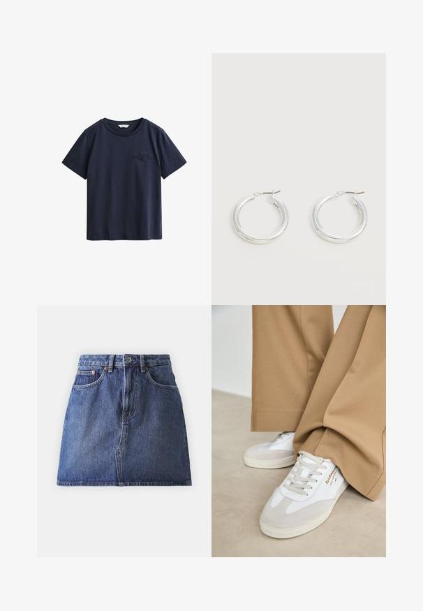 Camiseta de algodón azul marino de manga corta con cuello redondo y pequeño logo bordado de GANT en el pecho izquierdo.; Falda de mezclilla en azul oscuro, con cintura alta, cinco bolsillos y costuras en contraste. Bajo limpio y cierre clásico con botón en la cintura.; Zapatillas blancas con detalles de ante, cordones texturizados y suela de goma. Combinadas con un pantalón suelto en tono marrón claro. Logo exhibido en el lateral.; Par de pendientes de aro plateados brillantes de tamaño mediano con cierres metálicos finos sobre un fondo neutro claro.