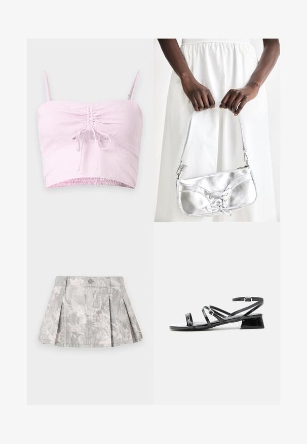 Lys pink cropped top med justerbare spaghetti-stropper, samlet frontdetalje og elastisk kant. Struktureret stof tilføjer blødhed.; Grå denimnederdel med plisseringer, med et subtilt bladmønster i lysere nuancer. Klassisk snit med taljebånd og metalknaplukning.; Sort laklædersandal med lav hæl, flere tynde remme og en lille spændeankelrem på en hvid baggrund.; Sølvmetallic håndtaske med snøredetaljer, der har et slankt design og en kort strop. Tasken holdes i hænderne for at fremvise dens tekstur.