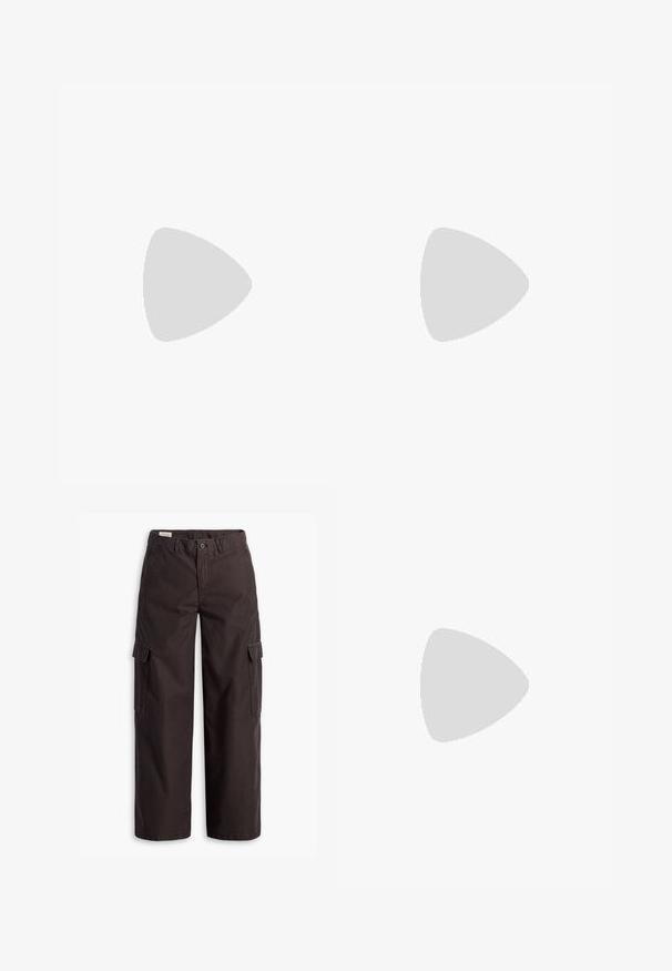 Haut court noir sans manches présentant un grand signe de paix vert abstrait entouré d'un motif de chaîne, confectionné en tissu doux.; Pantalons cargo droits marron foncé avec poches latérales à rabat, fermeture à bouton, passants de ceinture et zip à l'avant.; Chaussure de course Nike gris clair et blanc avec mesh et semelle amortie, montrée en plein air contre un fond de marches en béton.; Sac à épaule en tissu noir avec une surface texturée douce, de forme arrondie et une seule sangle. Design minimaliste sans accessoires ni quincaillerie visibles.