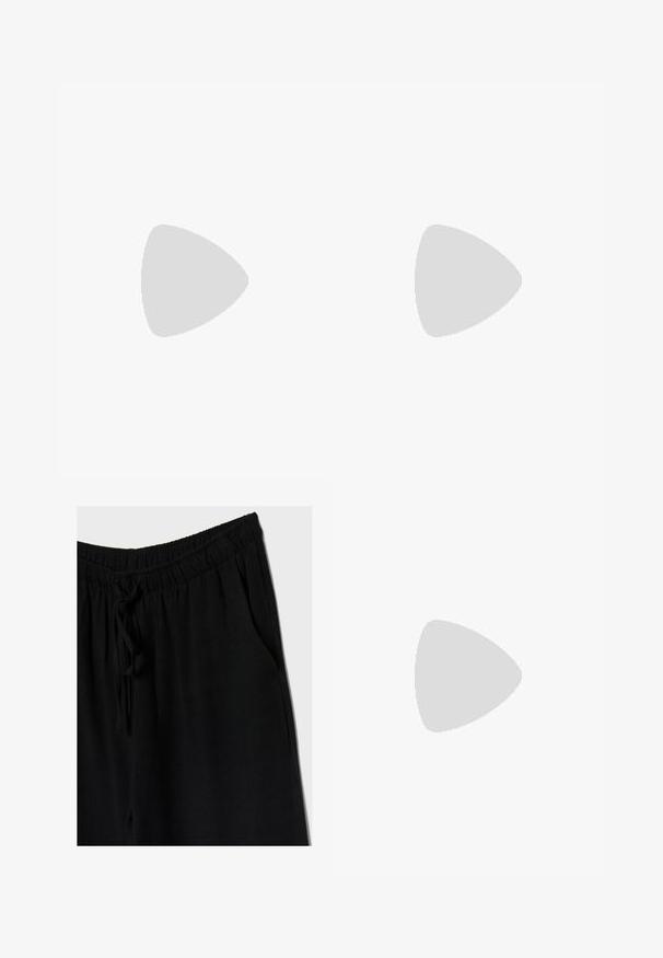 Top noir à col halter avec un décolleté plongeant en V, taille froncée et fermeture par nouage au niveau du cou, présenté sur un fond blanc.; Pantalons noirs avec une taille élastique et un cordon de serrage, offrant une coupe décontractée et des poches latérales. Le matériau semble doux et léger.; Chaussure slingback en cuir verni noir avec un bout pointu, un design minimaliste, un petit talon et un accent en boucle argentée sur la sangle.; Lunettes de soleil noires en forme d'œil de chat avec des verres gris foncé, monture en plastique élégante, coins pointus et branches droites. Pas de métal visible ni d'accents.