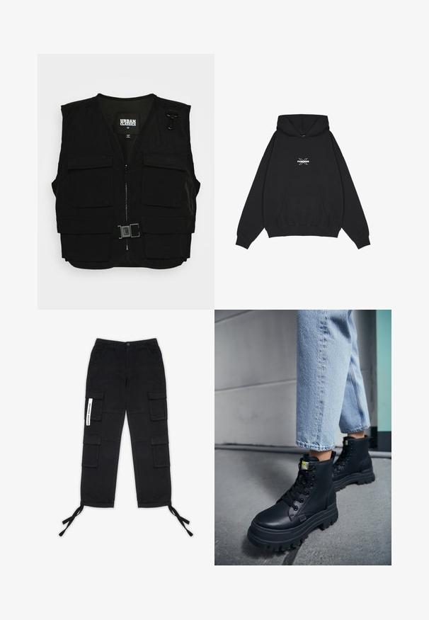 Sort vest med lynlås fortil, mesh-foring og flere frontlommer. Inkluderer metalclips og en spænde detalje. Størrelse medium.; Pegador BELLY OVERSIZED HOODIE - Hættetrøje - washed black; Pegador TANAMI WIDE PANTS - Cargobukser - black; Person iført lyseblå jeans og sorte chunky snørestøvler, der står på et betongulv nær en væg.