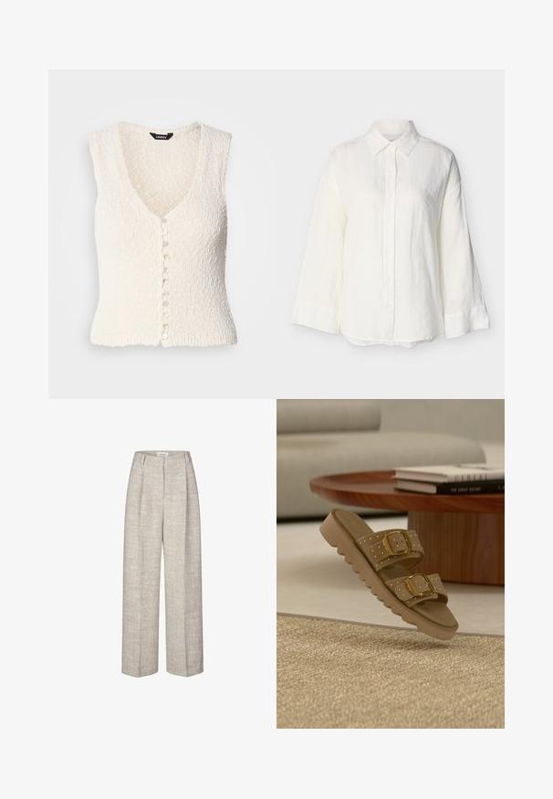 Chaleco de punto sin mangas de color blanco, con escote en V y tejido texturizado. Presenta un cierre frontal con botones redondos de color claro.; Camisa blanca de manga larga con botones, cuello puntiagudo y puños anchos, mostrada sobre un fondo claro y liso.; Pantalones de tiro alto en gris claro con una tela texturizada, piernas anchas y dos pliegues frontales. Con cierre de botón en la parte delantera y presillas para cinturón.; Sandalia de piel marrón con dos hebillas doradas y detalles con tachuelas, descansando cerca de una mesa de madera con libros apilados y un sofá beige al fondo.