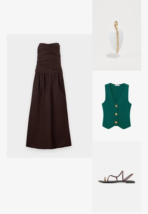 Groene mouwloze vest met een diepe V-hals, drie decoratieve knopen, waaronder een zonmotief, en een textuurstof.; Donkerbruine strapless maxi-jurk met geplooide lijf en verzamelde taille, uitlopend in een lange rok.; Bruine platte sandalen met meerdere slanke banden, een teugel en een gouden accent. De zool is plat en heeft een gladde afwerking.; Witte edelsteen hanger in de vorm van een traan, voorzien van een gouden band met een rij kleine, heldere stenen langs een rand.
