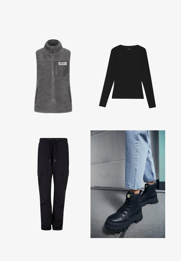 Gilet sans manches en polaire gris avec col haut, fermeture éclair frontale intégrale, poignet zippé sur la poitrine et deux poches latérales à boutons-pression.; T-shirt noir à manches longues en maille côtelée avec un col rond et une silhouette ajustée. Le tissu a une texture lisse et une qualité extensible.; Pantalons cargo noirs en tissu doux, dotés d'une taille élastique avec cordons de serrage et de poches latérales. Design à jambes droites.; Personne portant un jean bleu clair et des bottes noires épaisses à lacets, debout sur un sol en béton près d’un mur.