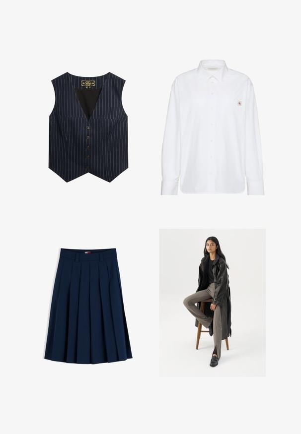Marine vest met witte streepjes, zonder mouwen, V-hals en zes bruine knopen aan de voorkant, gemaakt van een gladde stof.; Wit overhemd met lange mouwen, knopen, een puntige kraag en een klein Calvin Klein-logo op het linker borstzakje.; Marineblauwe geplooide rok met ceintuurlussen en een klein rood, wit en blauw logo-label op de tailleband, getoond op een witte achtergrond.; Zwarte leren trenchcoat met knopen en riemdetails, gecombineerd met lichtbruine getailleerde broek en zwarte loafers, zittend op een houten kruk.