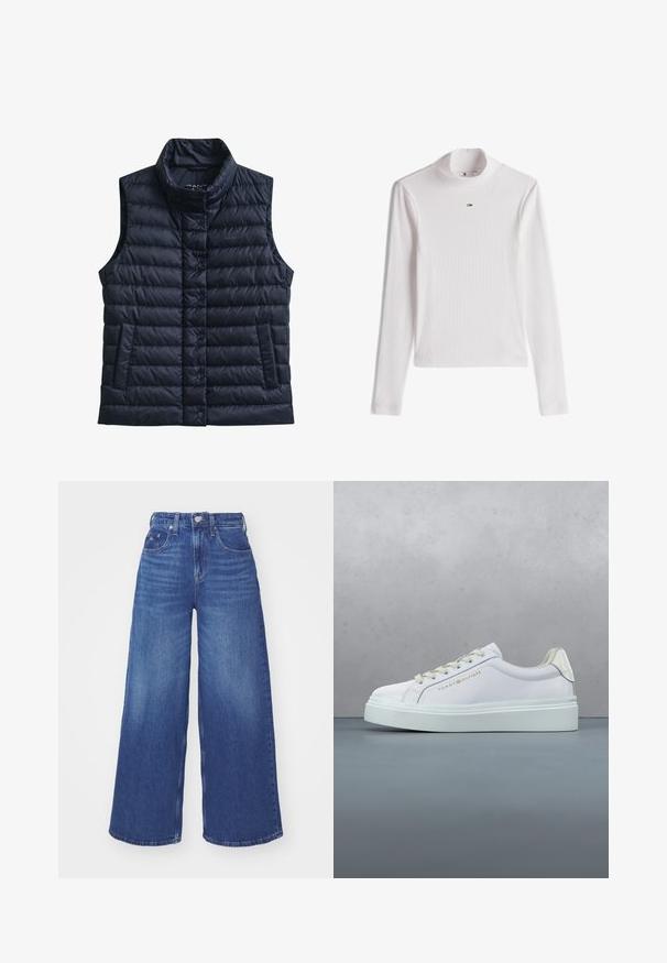 Zwarte doorgestikte mouwloze bodywarmer met hoge kraag, voorste drukknoopsluiting en twee voorzakken.; Wit geribd top met lange mouwen en coltrui, voorzien van een klein Tommy Hilfiger-logo, gecentreerd onder de kraag.; Hogwaisted blauwe denim jeans met brede pijpen, riemlussen, knoop aan de voorkant, ritssluiting en voor- en muntzakken.; Witte Tommy Hilfiger sneaker met dikke zool en veters, weergegeven boven een patroon van houten en keien op de grond buiten.