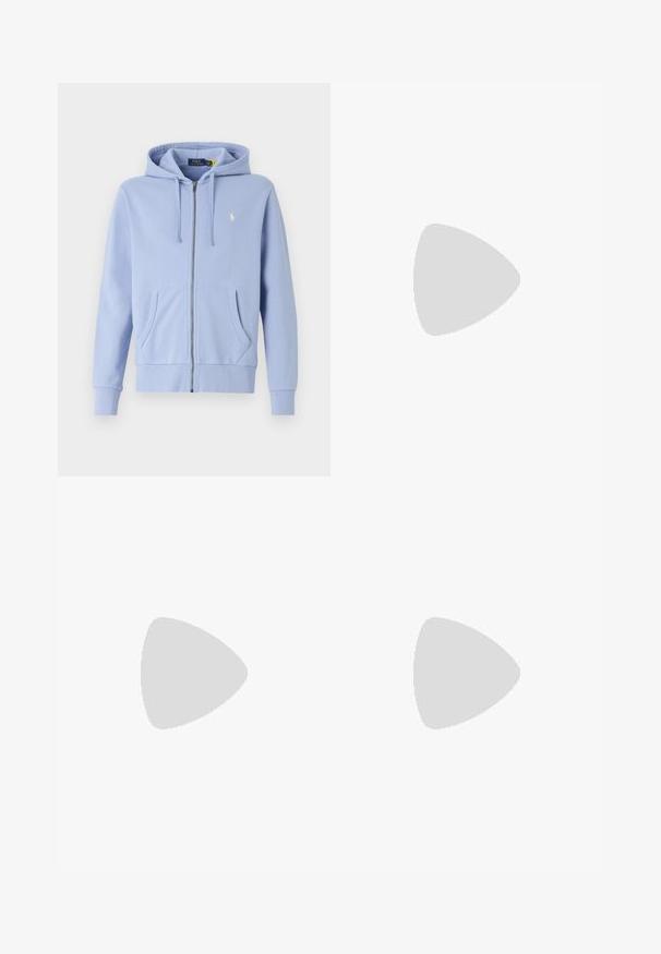 Veste à zip bleu clair en coton doux, dotée d'une poche kangourou, de poignets côtelés et d'un petit logo brodé sur la poitrine.; T-shirt oversize couleur crème en coton. Avec des manches courtes et un petit graphique de serpent noir sur la poitrine gauche.; Shorts légers avec une taille élastique, présentant un mélange de panneaux vert olive et beige, et une finition texturée.; Baskets en suède et mesh bleu marine avec un talon blanc et gris, lacets plats et semelle texturée. Présente un logo sur le côté.