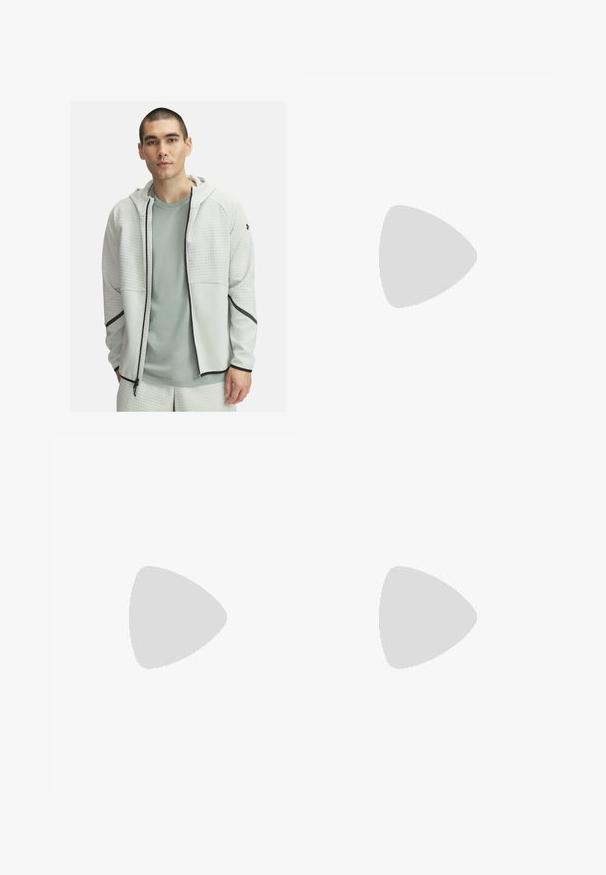 Sudadera con cremallera de color gris claro, fabricada con un tejido texturizado y una parte inferior suave, combinada con una camiseta de color verde claro. Presenta toques en negro.; Camiseta de manga corta en verde menta claro, hecha de tela suave. Presenta un cuello redondo y un corte recto simple, sin adornos.; Bañador azul claro hecho de tejido ligero, con una cinturilla elástica con cordón negro y bolsillos laterales.; Zapatilla deportiva blanca con parte superior de malla texturizada, swoosh negro de Nike, cuello acolchado y suela de goma con un patrón de taco.