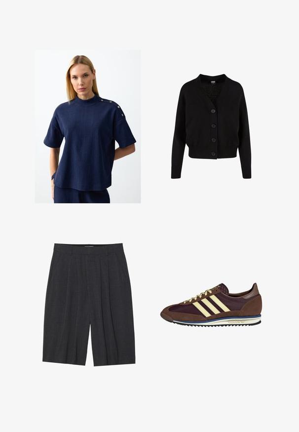 Black knit cardigan with a v-neck, five front buttons, ribbed hem and cuffs, and cropped design. Soft texture with a casual style.; Blonde woman wearing a navy textured short-sleeve top with a high collar and metal button details on the shoulder, hands behind back.; Dark grey pleated shorts made from textured fabric, featuring a waistband and a straight-leg cut, with no visible pockets or detailing.; Brown and burgundy sneaker with suede and mesh materials, featuring three cream stripes, textured fabric on the tongue, and a rubber sole.
