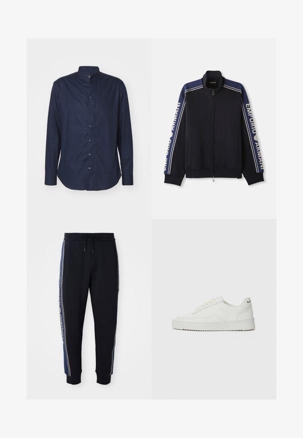 Giacca da track zip-up blu navy con doppie strisce beige chiaro sulle spalle e sulle maniche, testo "Emporio Armani" lungo entrambe le maniche.; Camicia a maniche lunghe blu navy con colletto alto, chiusura frontale con bottoni e texture liscia. Etichettata con un piccolo cartellino all'interno del colletto.; Pantaloni jogger neri con strisce laterali blu, vita elastica con cordoncino, tasche laterali e polsini a coste.; Sneaker in pelle bianca con una finitura liscia, punta rotonda, lacci piatti e suola testurizzata. Presenta un logo discreto sul tallone.