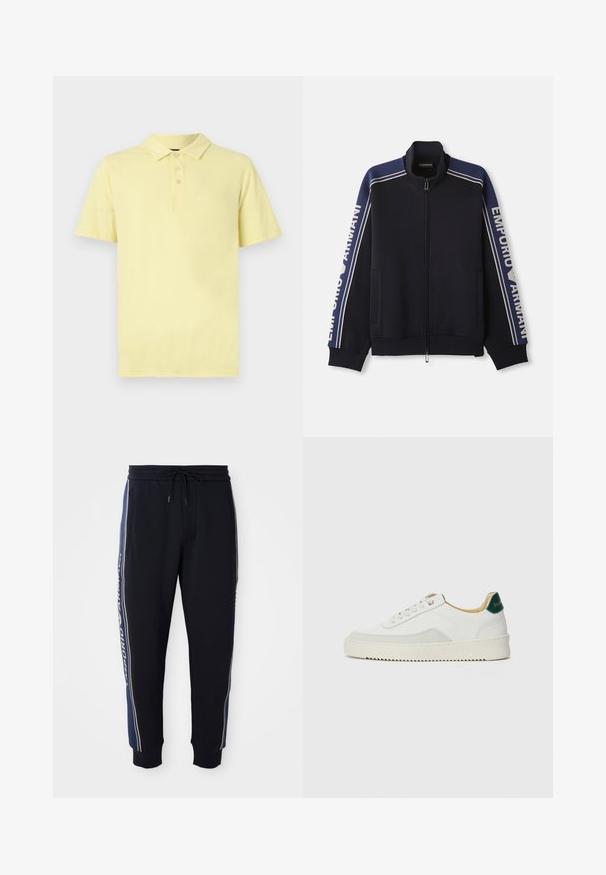 Tummansininen vetoketjullinen urheilutakki, jossa on vaaleanbeiget kaksoisraidat hartioilla ja hihoissa, "Emporio Armani" teksti molemmilla hihoilla.; Keltainen poolopaita, lyhyet hihat, kolme nappia kauluksessa, valmistettu pehmeästä puuvillakankaasta, jossa on sileä rakenne ja yksinkertainen muotoilu.; Mustat collegehousut, joissa on siniset sivuhihnat, joustava vyötärö naruilla, sivutaskut ja ribbaatut nilkkakumit.; Valkoiset tennarit, joissa on nahkaosia, pyöreä kärki, tasaiset nauhat ja kermaisa kumi-pohja. Takana vihreä brändäys.