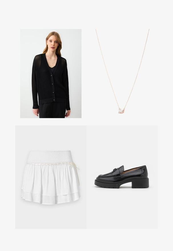 Vrouw met lichtbruin haar, gekleed in een zwarte gebreide cardigan met knopen over een zwart top, staand voor een effen lichte achtergrond.; Lichtblauwe blouse van glanzende stof, met een klassieke kraag, knoopsluiting aan de voorkant, puffen mouwen en een gelaagde, gerimpelde zoom.; Witte, gelaagde rok met een elastische tailleband, voorzien van een gestructureerde smockdetail en een decoratieve lintaccent. Katoenen stof.; Zwarte leren instapper met een lage blokhak, ronde neus, decoratieve strap en een geprofileerde stikselafwerking op de bovenkant. Gladde afwerking.; Roségouden ketting met een zwaan hanger, versierd met heldere kristallen. De ketting heeft een verfijnd schakeldesign.
