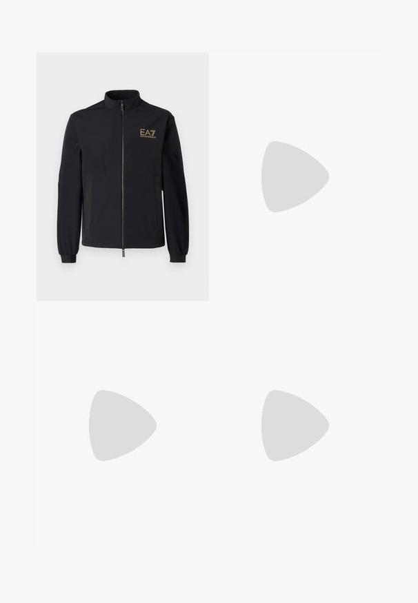 Black softshell jacket with a high collar, zip front, and two side pockets. Features a gold EA7 Emporio Armani logo on the chest.; Black sweatshirt made of cotton featuring large gold branding and graphic elements, including stripes and an eagle logo, with ribbed cuffs.; Black sweatpants with a drawstring waist, tapered legs, and a printed logo on the left thigh. Made from a smooth, lightweight fabric.; White leather sneaker with a smooth finish, round toe, flat laces, and a textured sole. Features a subtle logo on the heel.