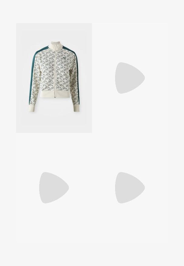 Chaqueta con un cuerpo crema y un patrón repetitivo de logotipos verdes, mangas de un verde oscuro que contrastan, un cuello alto y una cremallera frontal.; Conjunto de tres camisetas de manga corta en negro, gris y blanco. Están hechas de algodón, cuentan con cuello redondo y un diseño simple de un solo color.; Pantalones de chándal beige con relieve y cintura con cordón, y cortes laterales; presenta un logotipo bordado en el muslo. Textura suave, corte relajado.; Zapatillas de ante moradas con acentos blancos, logo dorado de "Puma", diseño texturizado y suela de goma negra. Estilo atlético de corte bajo.