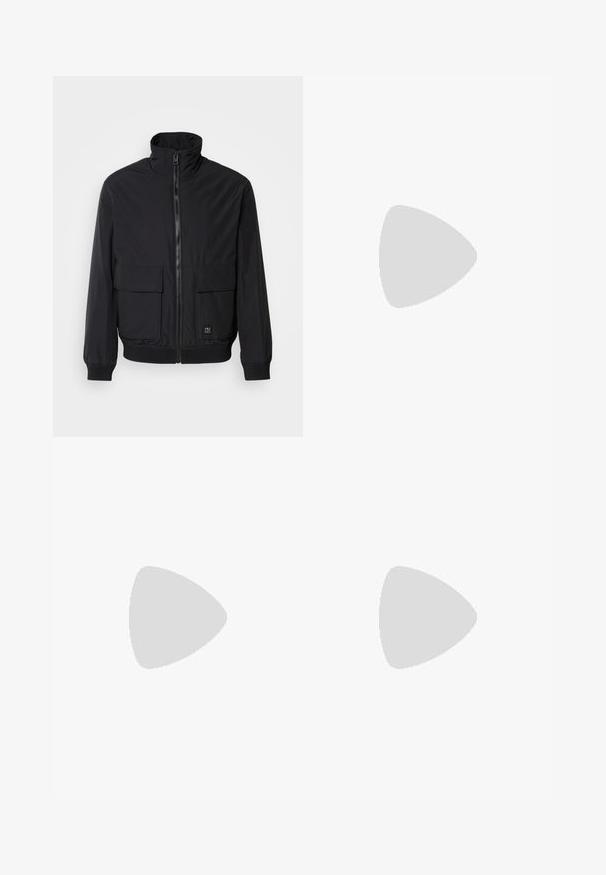 Black bomber jacket with a high collar, front zipper, two large patch pockets, elastic cuffs, and ribbed hem. Smooth fabric texture.; Navy blue knit sweater with a round neckline, ribbed cuffs and hem, and a small red logo on the chest. Smooth texture, casual design.; Black trousers with a pleated design, wide leg shape, and a smooth texture. Features a red waistband tag.; White leather sneaker featuring a textured upper, a round toe, minimalistic design, and a rubber sole with stitched detailing.