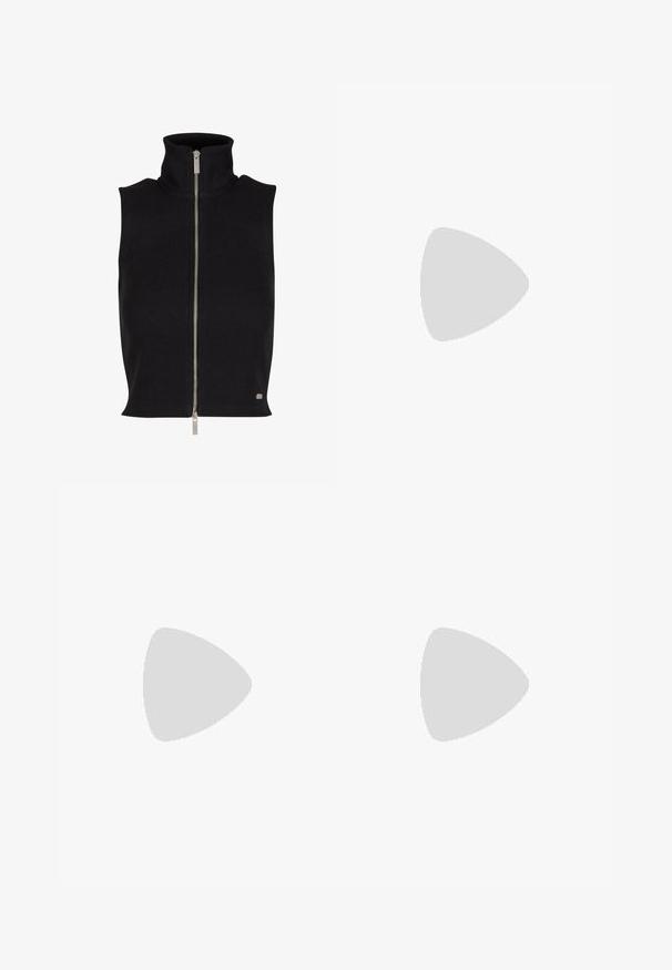Haut sans manches noir à côtes avec un col montant et une fermeture éclair argentée. Dispose d'une texture lisse et d'un petit détail de logo sur l'ourlet.; Haut sans manches noir à col roulé fabriqué en tissu extensible, avec un logo Levi's blanc central sur un patch rectangulaire, et une texture lisse.; Jupe noire avec un motif de cerises comprenant des cerises rouges et des feuilles vertes. Inclut une fente latérale pour un détail de design supplémentaire.; Baskets de sport beige et grises avec des matériaux en maille et en daim, un design superposé, des accents blancs et une semelle rembourrée.