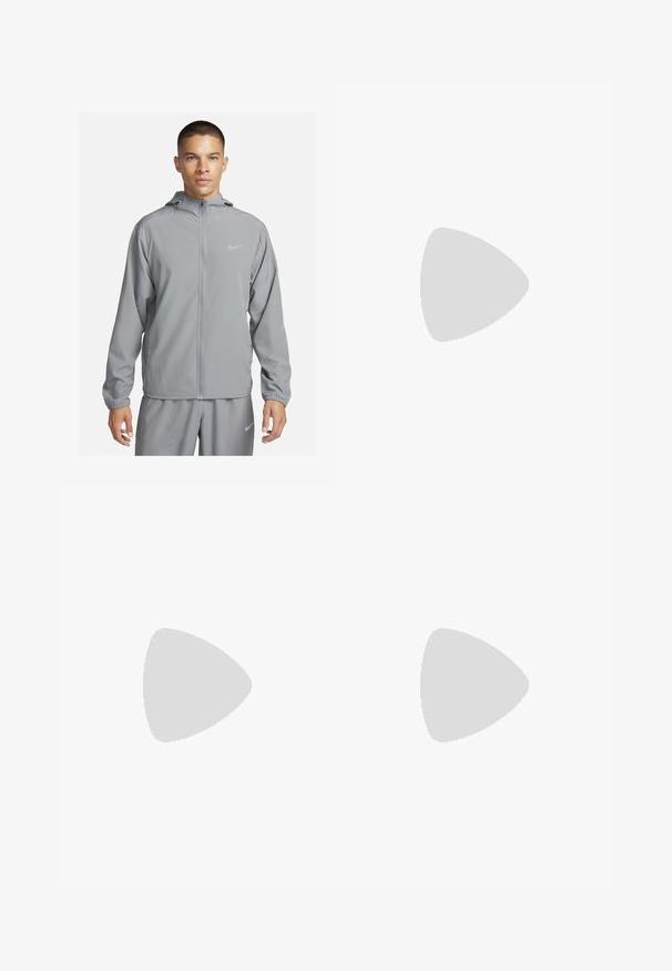 Light grey windbreaker jacket with a hood, full front zipper, elastic cuffs, and a small logo on the chest. Smooth, water-resistant material.; Light blue short-sleeve T-shirt made of soft fabric, featuring a crew neck and a small white logo on the upper left side.; Nike Pro pants in dark gray, featuring a black elastic waistband with "PRD" and "NIKE PRO" text, smooth fabric, tapered design, and subtle stitching details.; White athletic shoe with mesh upper, gray accents, and textured sole. Features round laces and a cushioned midsole for support.