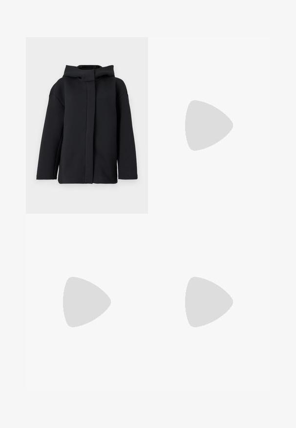 Black hooded sweatshirt with a relaxed fit, featuring a smooth texture, long sleeves, and a front opening without traditional closures.; Black cotton T-shirt with a crew neckline, short sleeves, and white printed "Calvin Klein" logo and "Established 1968" text.; Black leggings made of elastic material, featuring a high waist, zippered pockets with yellow accents, and a smooth texture.; Black leather sneaker with a rounded toe, white platform sole, and black laces. Features a subtle logo on the heel and smooth texture.