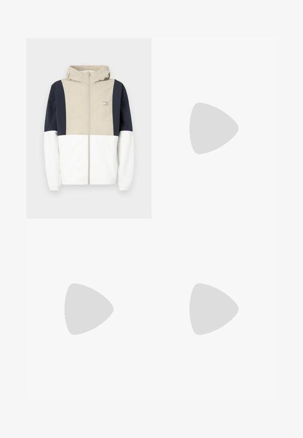 Színblokkolt dzseki, bézs felső résszel, tengerészkék ujjal és fehér alsó résszel. Kapucnival és elülső cipzárral rendelkezik. Könnyű anyag.; Fehér pamut póló rövid ujjakkal. Az elülső részen egy bézs színű nyomtatott logó található, amely "GUESS 1981" feliratú, valamint a "CLASSIC DESIGN LOS ANGELES, CA" szöveg.; Tengerészkék chino nadrág, elasztikus derékkal, elülső gombos záródással és egyenes lábbetétekkel. Simító textúra, látható minták nélkül.; Fehér sportcipők sima bőr felsőrésszel és velúr orr résszel, oldalukon egy kis piros, fehér és kék logóval, valamint texturált talppal.