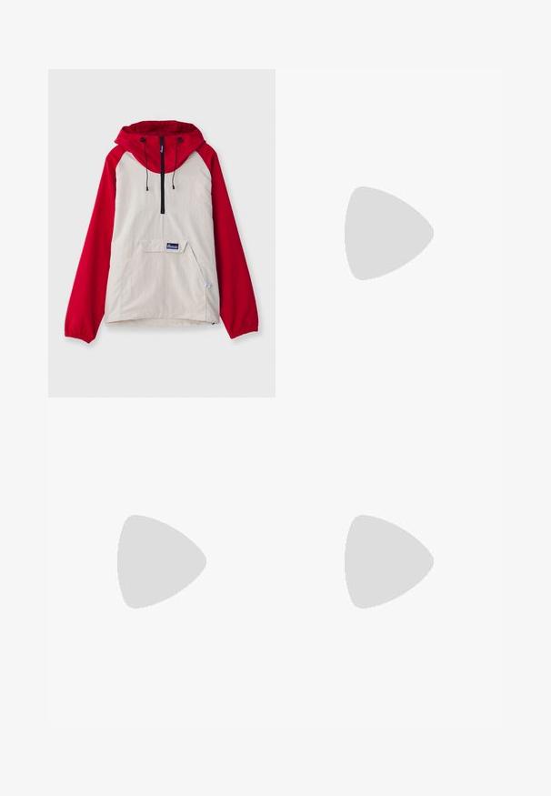 Anorak jacket featuring a beige body with red raglan sleeves, a front pocket, and adjustable drawstrings on the hood. Black zipper detail.; Nike black cotton t-shirt with a classic crew neck, short sleeves, and a subtle, embossed logo on the chest. Smooth texture.; Black drawstring waist casual pants with side seam pockets and straight leg cut on a plain background.; Black athletic shoes with textured fabric and rubber soles, featuring elastic laces and a blue accent on the heel. Worn with light denim pants.