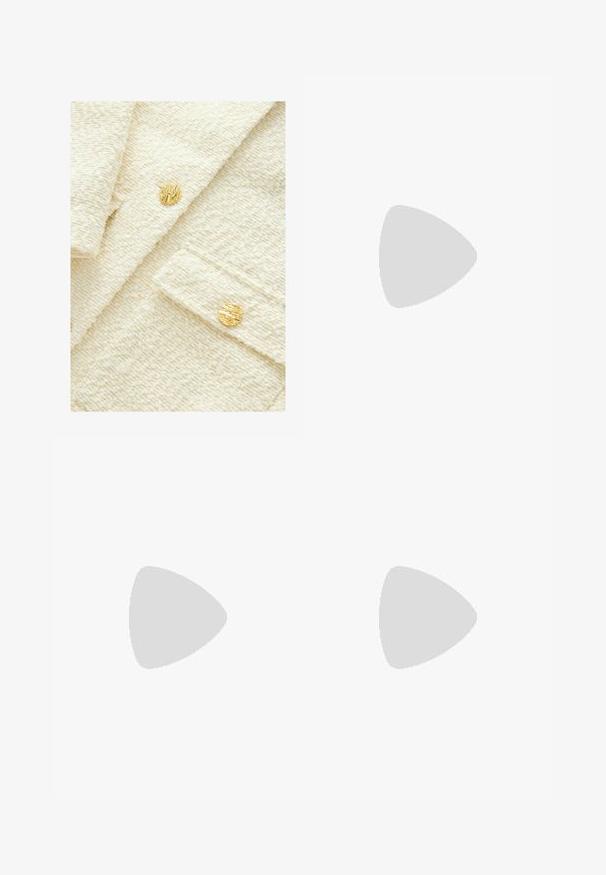Textured cream fabric with a soft, plush appearance, featuring two round gold buttons with a distinct, ribbed design.; White fitted top made of ribbed fabric with cap sleeves and gathered details at the sides for texture and shape.; White wide-leg trousers made from a lightweight fabric. Features an elastic waistband with a drawstring and side pockets. Smooth texture.; White high-heeled sandal with a chunky heel, featuring a strappy design and ankle tie. Smooth texture with a platform front for added height.