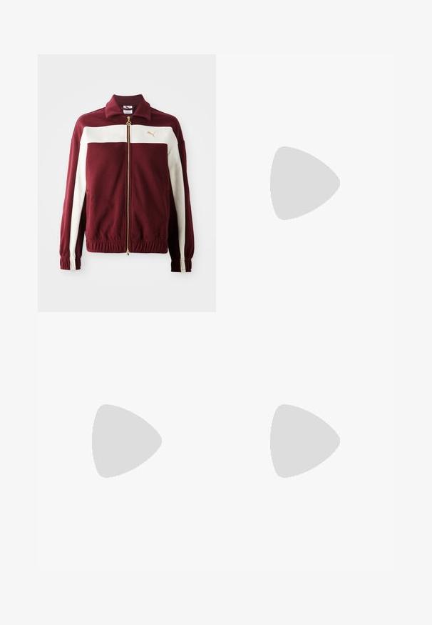 Burgundy zip-up jacket with white stripes on sleeves, gold zipper, and logo on chest. Ribbed cuffs and waistband with textured fabric.; Plain white t-shirt made of cotton with a round neckline, short sleeves, and a relaxed fit. Smooth texture with no patterns or accents.; Wide-leg black pants made of a soft, woven fabric. Features pressed creases, belt loops, and a clean, tailored finish.; Red suede sneakers with white accents, featuring textured material, round toe, and a gold logo on the side, worn with black pants.
