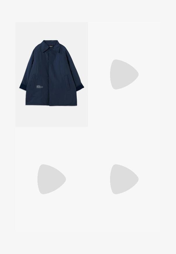 Navy blue coat in a lightweight, water-resistant fabric with a curved collar, side pockets, and white text detailing on the left side.; White cotton t-shirt with short sleeves, round neckline, and a relaxed fit. Smooth texture, no patterns or accents, minimalistic design.; Black tailored trousers with a straight-leg design, featuring a smooth texture and crisp creases along the front. No visible hardware.; Black leather slingback heels with a pointed toe, featuring a slim heel and a gold-tone accent on the adjustable strap. Smooth texture.