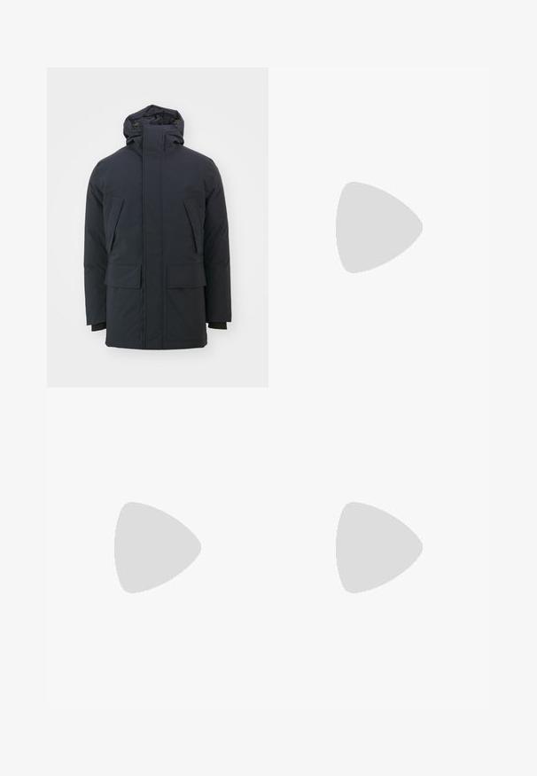 Navy blue insulated jacket with a high collar, adjustable hood, and two large front pockets. Smooth, matte fabric finish, long sleeves.; Black cotton t-shirt featuring bold white text design: "DSQUARED2" vertically and "ICON" horizontally on the side. Classic round neckline.; Filippa K TERRY CROPPED TROUSERS - Trousers - sage melange; White leather sneaker with a smooth surface, round toe, and minimalistic design. Features beige accents on the heel and a rubber sole.
