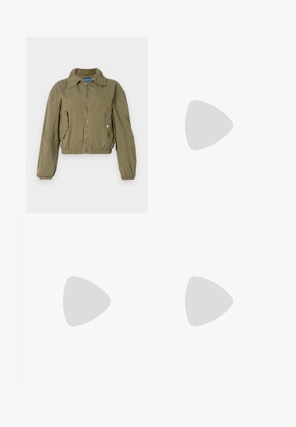 Cropped olive green bomber jacket with a zipper front, two side pockets, gathered cuffs, and a standing collar. Made of lightweight fabric.; White oversized t-shirt with short raglan sleeves, made of soft fabric. Features a subtle logo on the chest and a round neckline.; Beige tailored trousers with a straight cut, featuring pleats, a waistband, and a smooth texture. No visible pockets or embellishments.; Black leather mules with a pointed toe and low, block heel. Smooth texture with a sleek design. Open back with minimal detailing.