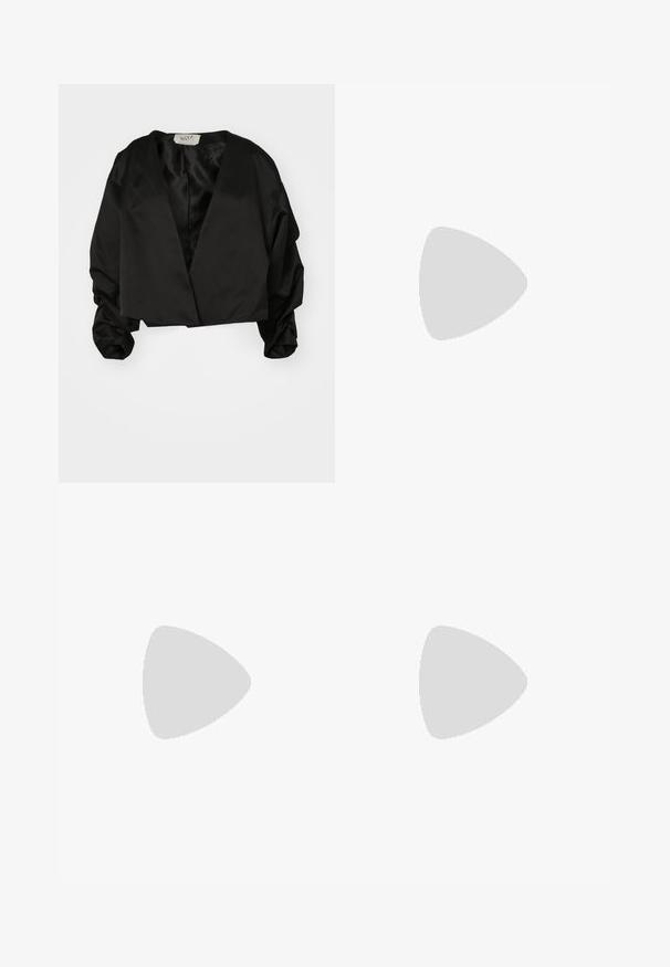 Black cropped jacket made of smooth satin with a deep V-neck and voluminous, gathered sleeves, featuring a minimalist design.; Black short-sleeve t-shirt with a draped scarf detail at the neckline. Soft fabric, relaxed fit, and loose silhouette.; Light blue wide-leg jeans made from denim, featuring a drawstring waistband and classic five-pocket design with minimal fading.; Stuart Weitzman EMILIA MARY JANE FLAT - Ankle strap ballet pumps - black