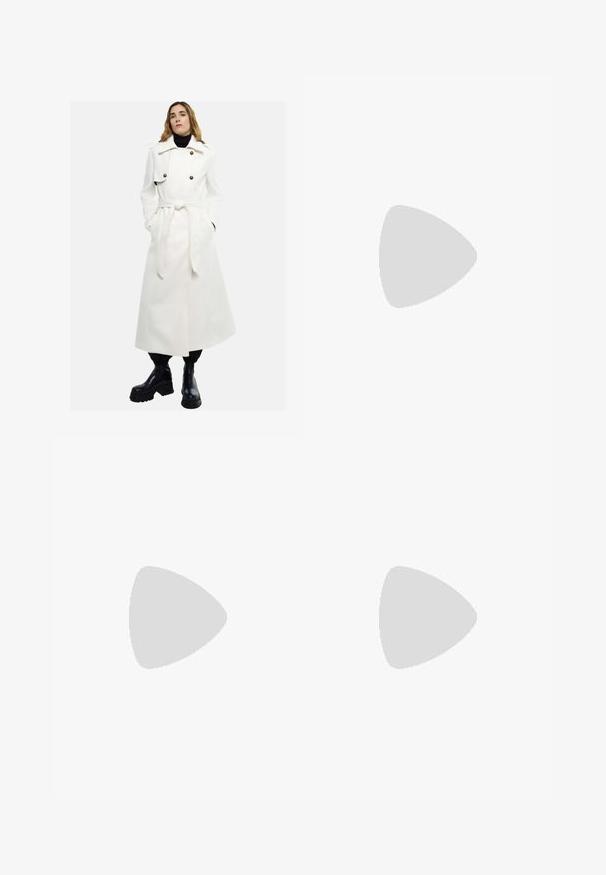 White long coat with double-breasted front, large buttons, and belted waist. Worn over a black turtleneck and paired with black chunky boots.; Cream cable-knit sweater with long sleeves, ribbed cuffs and hem, featuring a small embroidered logo on the left chest.; Light blue denim jeans with a straight cut, five-pocket design, and a button fly. Features subtle fading and orange stitching accents.; Black leather ankle boot featuring a chunky high heel, lace-up front, metal eyelets, and yellow stitching along the sole. Textured rubber outsole.