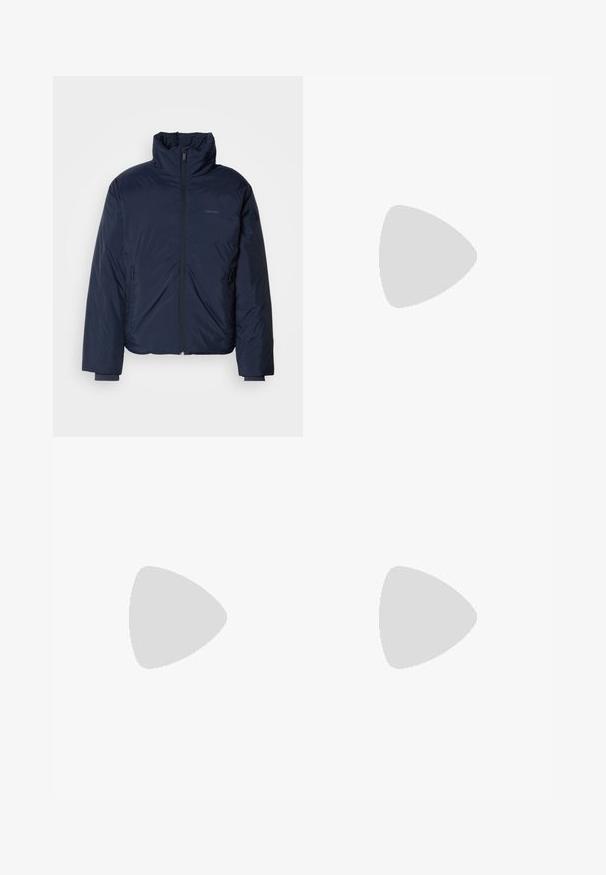 Navy quilted puffer jacket with high collar and full front zipper. Features zippered side pockets and ribbed cuffs for extra warmth.; White cotton t-shirt with short sleeves, crew neck, featuring a black CK logo on the left chest area, standard fit, smooth texture.; Cream-colored tailored pants with a textured fabric. Features a straight leg design, belt loops, and two front pockets. No patterns.; White leather sneakers with gray suede accents and a tan leather heel tab. Features a textured surface and lightweight sole.