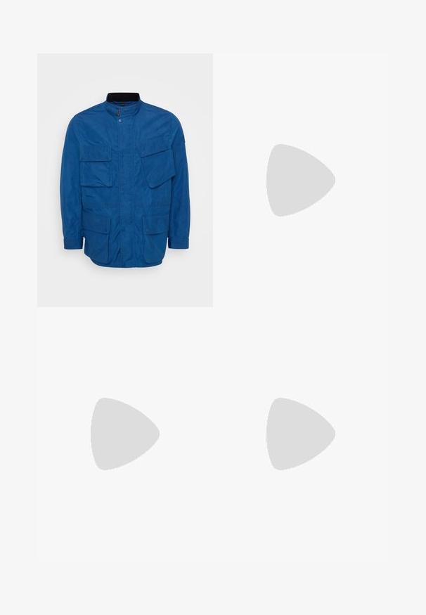 Blue jacket with a high collar, front snap closure, and multiple large flap pockets. Made of smooth material with a structured fit.; White short-sleeve t-shirt made of cotton with a crew neck. Features subtle embossed logo detail on the front and a red label at the hem.; Navy blue pants made of smooth fabric, featuring a button closure, belt loops, and subtle stitching details; classic straight-leg design.; White slip-on sneakers with a textured surface, a thick sole, and minimalistic design. Features brand logo on the side.