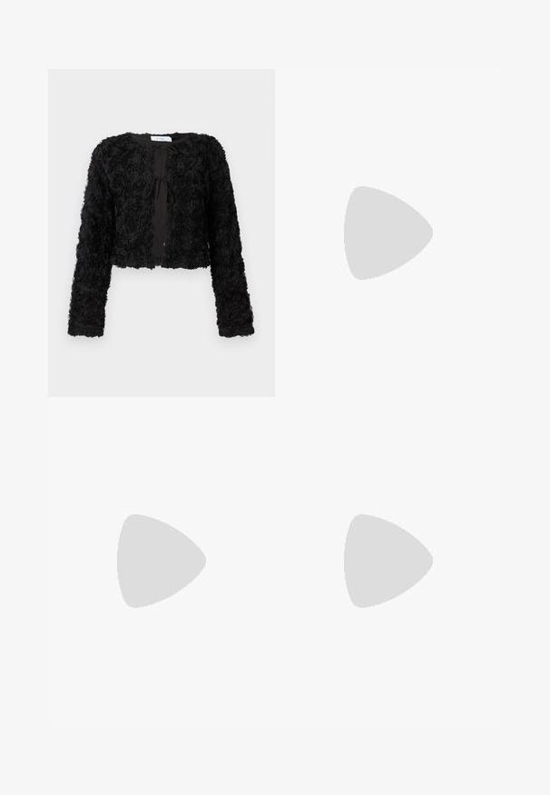 Black cropped jacket with a textured floral design, featuring long sleeves and a front tie closure, made from soft fabric.; Black sleeveless cotton t-shirt featuring multicolored graphic with wings, roses, and text "REBEL ROCK." Round neckline and relaxed fit.; Beige, elastic-waist pants with a drawstring. Straight leg design, made from a soft material, featuring minimalistic style without patterns or accents.; Black leather slingback heeled shoe with a pointed toe and a chunky block heel. Features an adjustable strap with a metal buckle.