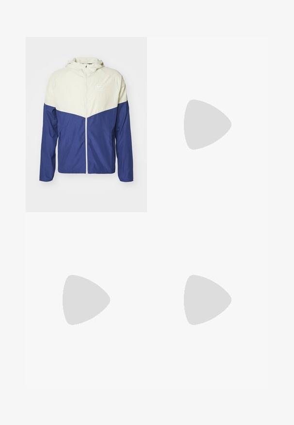 Nike vēja jakas augšējā daļa ir krēmkrāsā, bet apakšējā daļa ir tumši zila, ar garām piedurknēm, kapuci un priekšējo rāvējloku. Izšūta logo uz krūts.; Balts kokvilnas T-krekls ar īsām piedurknēm un apaļu kakla izgriezumu. Uz krūtīm ir maza, diskrēta Nike logo un sānu birka.; Melnu džinsu bikses ar taisnu kāju dizainu, ar pogu un rāvējslēdzēju, jostu cilpām un minimālu šuvju detaļām.; Skrienotāji ar vieglu beigu sintētisko virsmu, baltiem šņorēm un redzamu amortizāciju. Iezīme gluda zole un smalki sānu akcenti.