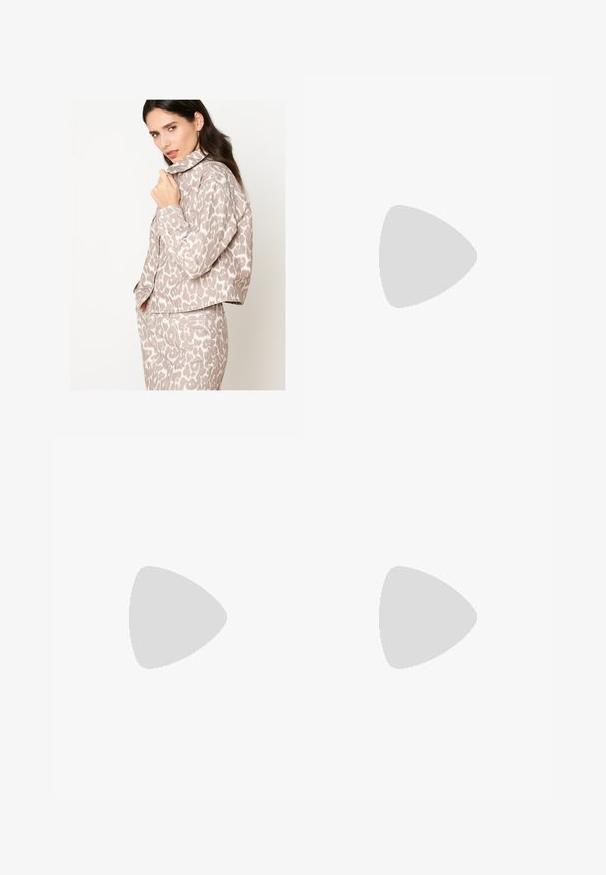 Cropped jacket in beige fabric with white leopard print, featuring a collared neckline and button closure, styled with matching pants.; Long-sleeve turtleneck top in a light beige color. Made of soft, stretchy fabric with a relaxed fit and a fold-over neckline.; Light blue denim wide-leg jeans with a high waist, faded areas, five pockets, and contrast stitching. Classic button and zipper closure.; Brown suede slip-on shoe with red and cream patterned trim, textured sole, and UGG logo on side. Features a slight platform height.; Tortoiseshell sunglasses with elongated oval lenses, brown tint, gold logo accents on temples, and sleek black arms.; Curved cream leather handbag with a single strap, gold hardware, and subtle branding at the bottom. Zipper closure along the top edge.