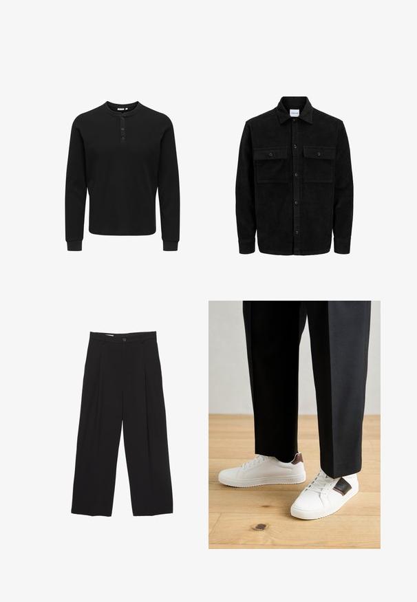 Czarna kurtka z korduru z guzikami, z dwoma przednimi kieszeniami na klapki oraz klasycznym kołnierzem, długimi rękawami i ryżowym splotem.; Czarna koszulka henley z długim rękawem, wykonana z teksturowanej tkaniny, z trzema guziczkami, okrągłym dekoltem i dopasowanymi mankietami.; Czarne spodnie o szerokich nogawkach, wykonane z gładkiego materiału, z płaskim pasem, plisami z przodu oraz pojedynczym zapięciem na guzik.; Białe trampki o gładkiej fakturze, z brązowymi skórzanymi akcentami i czarnymi detalami, zestawione z czarnymi eleganckimi spodniami. Tło stanowi drewniana podłoga.