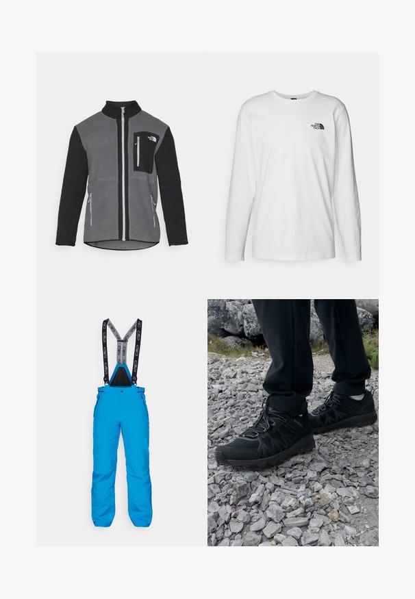 Fleecová bunda v šedé a černé barvě, s vysokým límcem, zipovými kapsami a náprsní kapsou s logem. Měkká, texturovaná látka.; Bílý dlouhý rukáv tričko vyrobené z bavlny s kulatým výstřihem. Na hrudi se nachází malé černé logo. Hladká textura, běžný střih.; Modré lyžařské kalhoty s nastavitelnými černými a šedými kšandami, se zapínacími bočními kapsami a odolným, voděodolným materiálem.; Černé venkovní boty z prodyšného a syntetického materiálu, s texturovaným svrškem, bezpečným šněrovacím systémem a robustní podrážkou, na skalnatém terénu.
