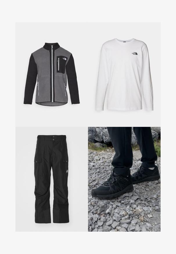 Kurtka polarowa w kolorze szarym i czarnym, z wysokim kołnierzem, zamykanymi na zamek kieszeniami oraz kieszenią na piersi z logo. Miękki, teksturowany materiał.; Biała koszulka z długim rękawem wykonana z bawełny, z okrągłym dekoltem. Posiada małe czarne logo na piersi. Gładka faktura, regularny krój.; Czarne spodnie cargo wykonane z materiału wodoodpornego, z dwoma kieszeniami bocznymi, wzmocnioną dolną częścią nogawki i zapięciem na guziki w pasie.; Czarne buty outdoorowe wykonane z siateczki i materiału syntetycznego, z fakturowaną cholewką, zabezpieczonym systemem sznurowania i solidną podeszwą, na skalistym terenie.
