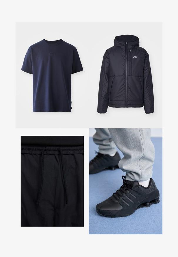 Svart, polstret Nike-jakke med frontglidelås og hette. Har en hvit logo på venstre bryst og doble frontlommer. Glatt ytterside.; Mørkeblå bomulls-T-skjorte med rund hals, korte ermer og brodert logo på brystet. Glatt tekstur, avslappet passform.; Sorte shorts med snor i livet, lett stoff med en jevn tekstur, og et enkelt design uten synlige logoer eller mønstre.; Person som har på seg svarte Nike Shox-sko og grå joggebukser og står på lyseblått teppe.