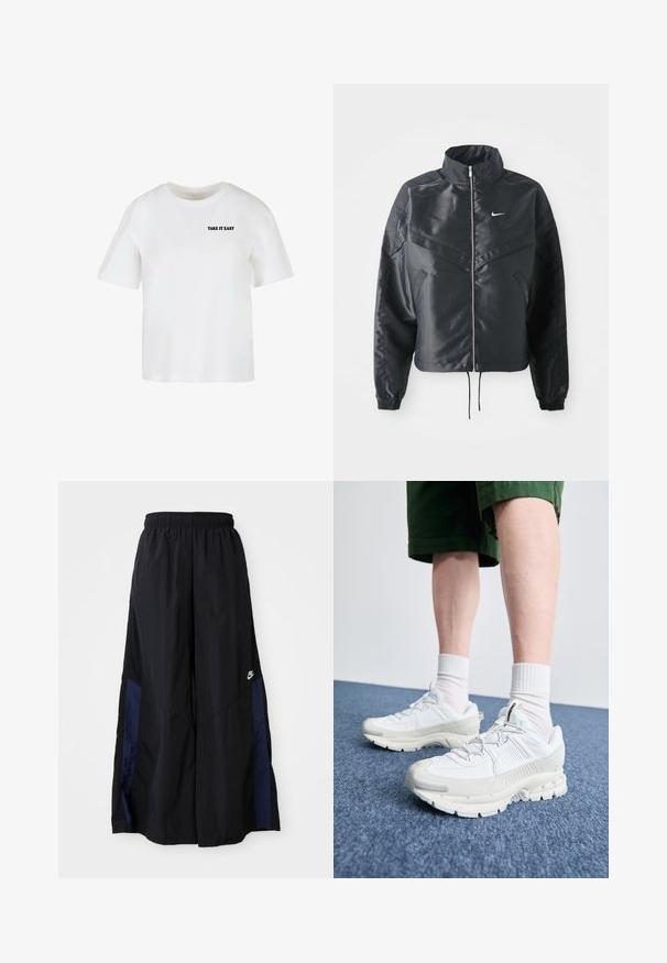 Zwarte cropped jack met hoge kraag, ritsluiting, elastische manchetten en een wit Nike-logo. Glad, glanzend materiaal met een licht gestructureerd oppervlak.; Witte korte mouwen t-shirt van katoen, met een ronde halslijn en de tekst "TAKE IT EASY" in het zwart gedrukt op de voorkant.; Zwarte wijdlopende broek van lichtgewicht stof, met een marineblauwe zijpaneel en een elastische tailleband. Klein wit logo onderaan.; Witte sportieve schoenen met textuuroverlays, een dikke zool en grijze accenten. Draag ze met witte crew-sokken en groene shorts op een blauwe ondergrond.