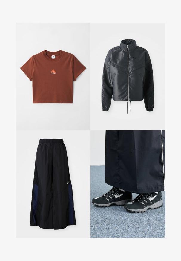 Fekete, rövidített dzseki magas gallérral, cipzáras záródással, elasztikus mandzsettákkal, és fehér Nike logóval. Simább, fényes anyag, enyhén textúrázott felülettel.; Barna pamut crop póló, amelyen egy kis narancssárga hímzett logó található a mellkas területén, klasszikus kerek nyakkivágással. Rövid ujjú.; Fekete, bő szárú nadrág könnyű anyagból, tengerészkék oldalsó panellel és elasztikus derékkal. Kicsi fehér logó az alján.; Fekete sportcipők, textúrált felsőrésszel, ezüst kiegészítőkkel és mintás talppal, fekete hosszú ruhadarabbal párosítva. Kék szőnyegen.