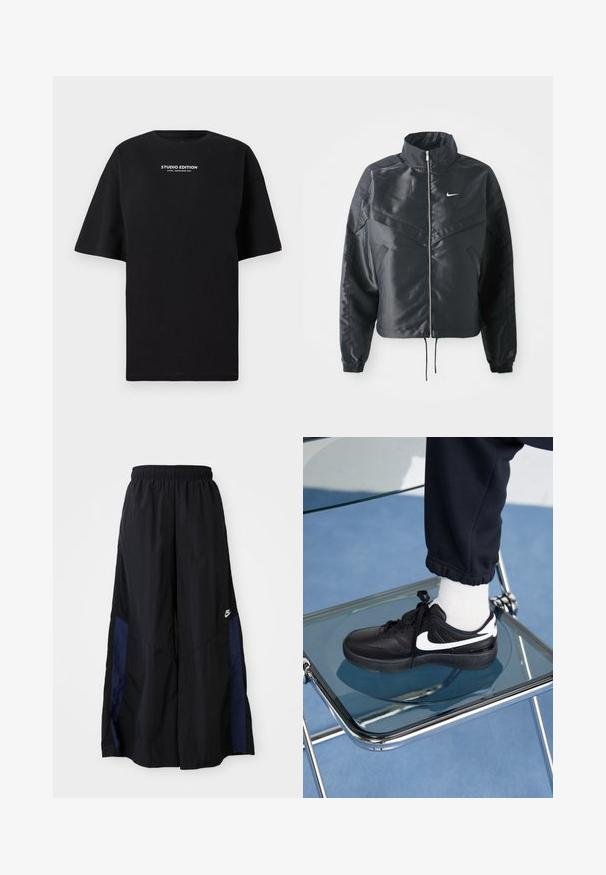 Chaqueta negra corta con cuello alto, cierre de cremallera, puños de elastano y un logo de Nike en blanco. Tejido suave y brillante con una superficie ligeramente texturizada.; Camiseta negra de talla grande hecha de algodón, con cuello redondo y mangas cortas, con "EDICIÓN DE ESTUDIO" impreso en blanco.; Pantalones de pierna ancha negros, confeccionados en una tela ligera, con un panel lateral azul marino y una cinturilla elástica. Logotipo blanco pequeño en la parte inferior.; Zapatillas Nike negras con acentos blancos, con una textura de cuero suave, diseño de cordones y punta redondeada, colocadas sobre una silla de cristal.
