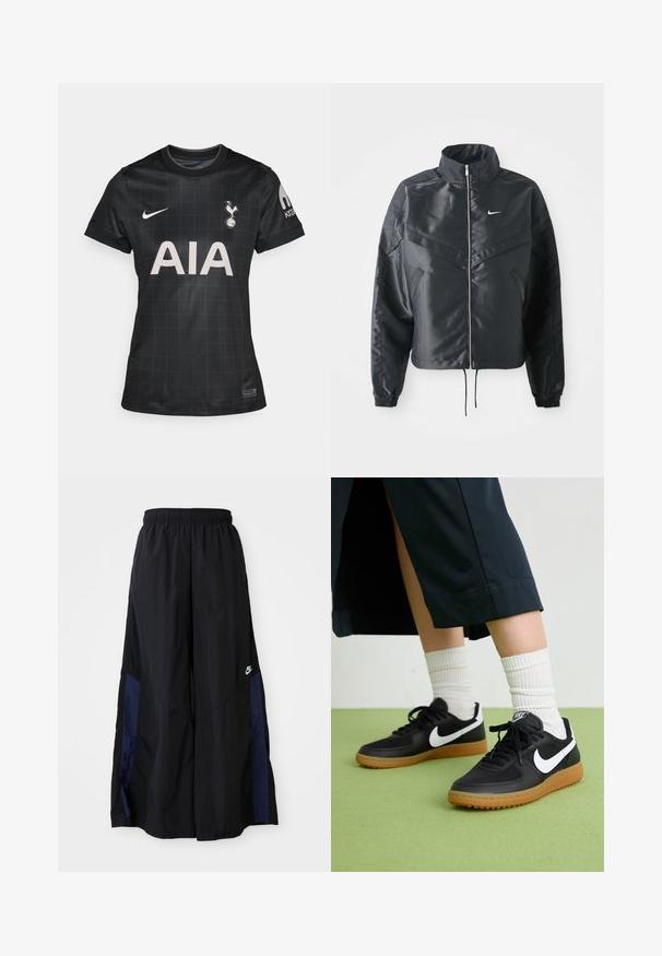 Zwarte cropped jack met hoge kraag, ritsluiting, elastische manchetten en een wit Nike-logo. Glad, glanzend materiaal met een licht gestructureerd oppervlak.; Zwarte voetbalshirt met een ruitpatroon, voorzien van een ronde kraag, korte mouwen en de logo's van Nike en Tottenham Hotspur.; Zwarte wijdlopende broek van lichtgewicht stof, met een marineblauwe zijpaneel en een elastische tailleband. Klein wit logo onderaan.; Zwarte leren en synthetische sneakers met witte Nike swoosh, rubberen gumzool, ronde neus en zwarte veters. Geribbelde witte sokken zichtbaar.
