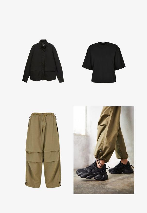 Zwarte jas met een hoge kraag, ritssluiting aan de voorkant en twee grote klepzakken. Gemaakt van een gladde, lichte stof met een relaxte pasvorm.; Zwart cropped t-shirt van katoen. Heeft korte mouwen en een ronde halslijn. Glad materiaal met een eenvoudig ontwerp, geen extra patronen.; Tan cargobroeken met een elastische taille, grote voorzakken en verstelbare manchetten. Gemaakt van lichtgewicht stof met een zachte textuur.; Persoon met zwarte chunky sneakers en olijfgroene cargobroek staat op een betonnen vloer naast een witte muur.