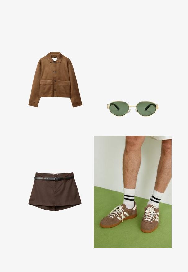 Brahno zamšast plašč z ovratnikom, sprednjim zapiranjem na gumb in dvema velikima žepoma. Teksturna površina in skrajšana zasnova.; Dolgimi rokavi v kremni barvi, z rahlim nabiranjem ob straneh in klasičnim ovratnikom. Gladka tekstura, preprost dizajn.; Rjave krojene kratke hlače z ozkim črnim pasom, prejetim skozi zanke za pas, prikazane na belem ozadju.; Rjavi semiš športni čevlji z belimi detajli in vezalkami. Gumijast podplat. Nošeni z belimi nogavicami z črnimi črtami. Zelena teksturirana talna obloga.; Očala z zlatim kovinskim okvirjem, zelenimi lečami, ovalne oblike, črnimi uhani in prozornimi nosnimi blazinicami. Čist, minimalističen dizajn.
