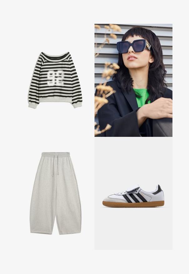 Czarna kurtka z futerka syntetycznego z zapięciem na zamek z przodu, kapturem i kieszeniami bocznymi. Charakteryzuje się gładką teksturą i luźnym krojem, co zapewnia komfort.; Pasiasty sweatshirt w kolorze czarnym i szarym, z projektem odkrywającym ramiona i wyraźnym białym nadrukiem "92" z przodu. Miękka tekstura, mankiety z zamkniętym ściągaczem.; Jasnoszare szerokie spodnie dresowe z elastycznym pasem i sznurkiem, z bocznymi kieszeniami i luźnym krojem.; Białe skórzane sneakersy z czarnymi paskami i szarymi akcentami, z zaokrąglonym czubkiem i gumową podeszwą. Zapięcie na rzep oraz sznurowanie.; Przesadnie duże czarne okulary przeciwsłoneczne z grubą oprawką i złotym akcentem, noszone z czarną marynarką i jasnoróżową koszulą, na poziomym tle.