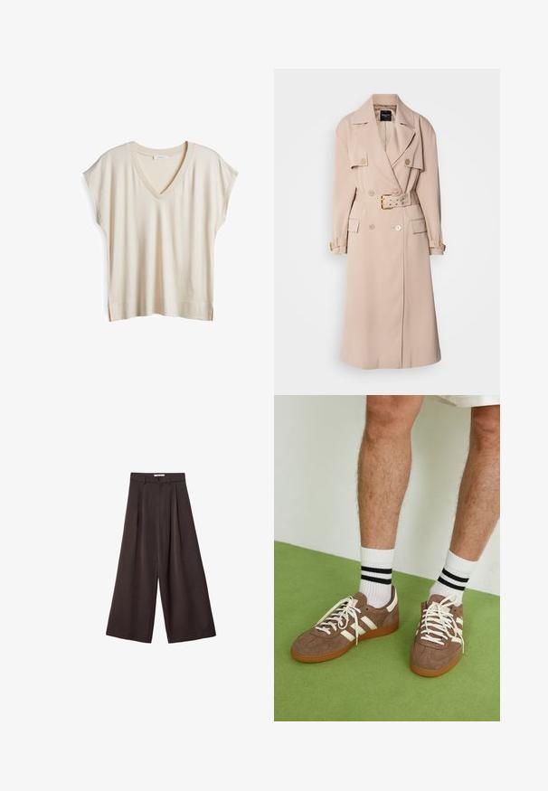 Cappotto beige con design doppiopetto, ampie rever, vita cintata e tasche laterali. Presenta accessori in tonalità dorata e una texture liscia.; Top a maniche corte con scollatura a V in un leggero tessuto beige. Presenta un colletto a costine e spacchi laterali all'orlo per facilitare i movimenti. Texture morbida.; Pantaloni neri a gamba larga con vita alta, caratterizzati da pieghe frontali e chiusura con bottone in vita, realizzati in tessuto liscio.; Sneaker in suede marrone con dettagli e lacci bianchi. Suola in gomma color gomma. Indossati con calzini bianchi con righe nere. Pavimento verde texturizzato.