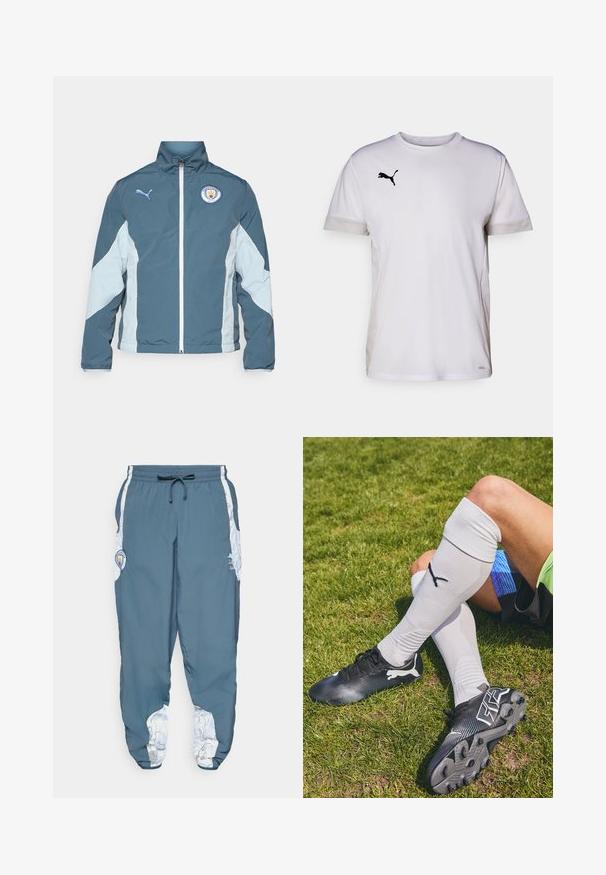 Tuulitakki tummansinisessä ja vaaleansinisessä, jossa on vetoketjukiinnitys, korkea kaulus ja Manchester Cityn logo rinnassa.; Valkoinen lyhythihainen urh-Shirt, jossa on pyöreä pääntie, ja sivuilla hengittäviä verkkomateriaaleja sekä musta Puma-logo rinnassa.; Sinisiä track-housuja, joissa on elastinen vyötärö ja naru. Sivusaumoissa on valkoinen kuviointi. Mukana brändin logopatch.; Mustat jalkapallokengät, joissa on teksturoitu pinta, valkoiset korostukset ja yhteensopivat polvisukat, joissa on logo. Taustalla nurmikko.
